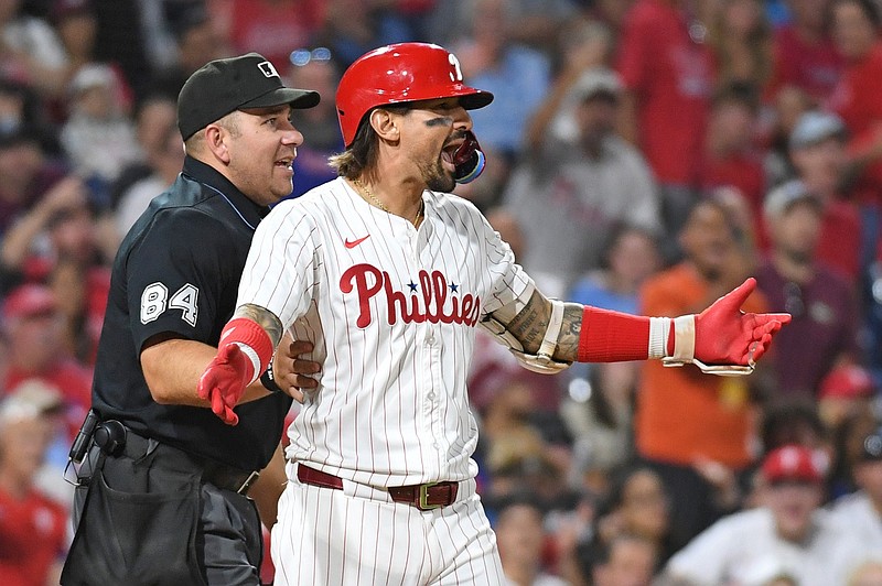 Sep 10, 2024; Philadelphia, Pennsylvania, USA; Philadelphia Phillies outfielder Nick Castellanos (8 )reacts after getting hit by a pitch during the eighth inning against the Tampa Bay Rays at Citizens Bank Park. Mandatory Credit: Eric Hartline-Imagn Images