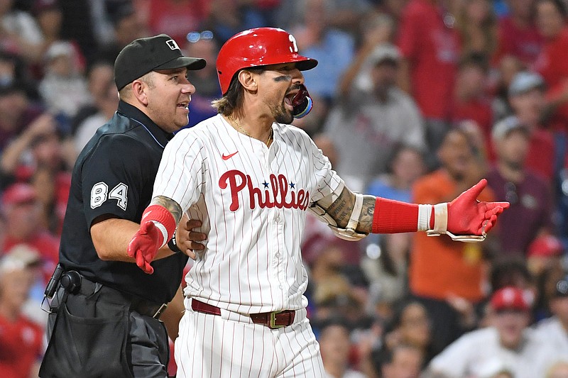 Sep 10, 2024; Philadelphia, Pennsylvania, USA; Philadelphia Phillies outfielder Nick Castellanos (8 )reacts after getting hit by a pitch during the eighth inning against the Tampa Bay Rays at Citizens Bank Park. Mandatory Credit: Eric Hartline-Imagn Images