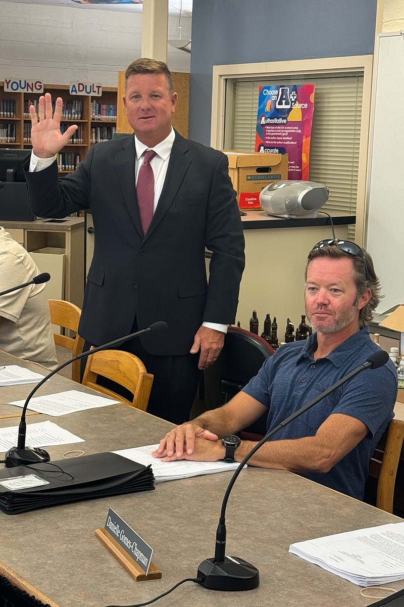 Sgt. Stephen Swift of the Margate City Police Department is sworn in as a member of the Margate Board of Education, Wednesday, Sept. 11, 2024.