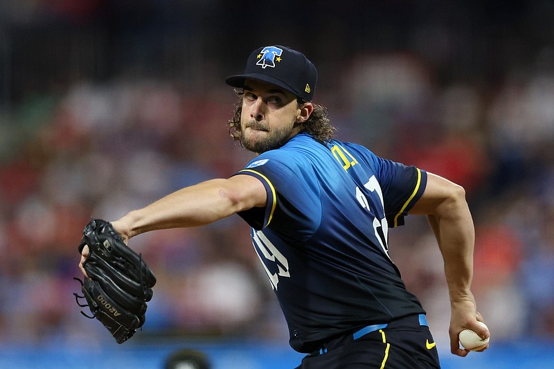 Sep 13, 2024; Philadelphia, Pennsylvania, USA; Philadelphia Phillies pitcher Aaron Nola (27) throws a pitch during the fifth inning against the New York Mets at Citizens Bank Park. Mandatory Credit: Bill Streicher-Imagn Images