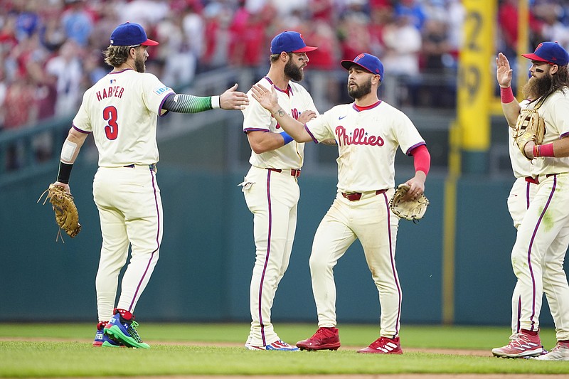 Sep 14, 2024; Philadelphia, Pennsylvania, USA; Philadelphia Phillies first baseman Bryce Harper (3) and center fielder Cal Stevenson (47) celebrate after defeating the New York Mets at Citizens Bank Park. Mandatory Credit: Gregory Fisher-Imagn Images