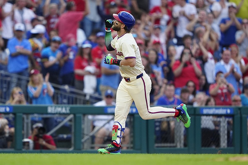 Sep 14, 2024; Philadelphia, Pennsylvania, USA; Philadelphia Phillies first baseman Bryce Harper (3) reacts to hitting his second home run as he rounds the bases against the New York Mets during the sixth inning at Citizens Bank Park. Mandatory Credit: Gregory Fisher-Imagn Images