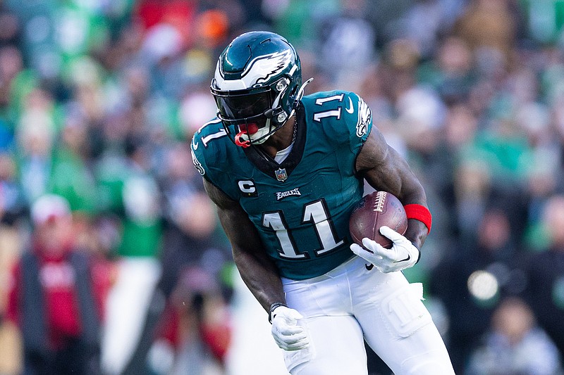 Dec 31, 2023; Philadelphia, Pennsylvania, USA; Philadelphia Eagles wide receiver A.J. Brown (11) runs with the ball during the fourth quarter against the Arizona Cardinals at Lincoln Financial Field. Mandatory Credit: Bill Streicher-USA TODAY Sports