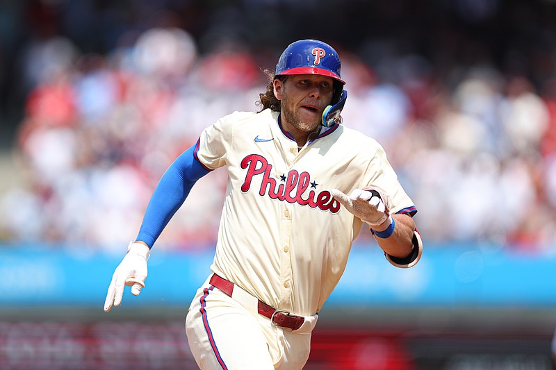 Jul 31, 2024; Philadelphia, Pennsylvania, USA;  Philadelphia Phillies third base Alec Bohm (28) runs the bases after hitting a triple during the sixth inning against the New York Yankees at Citizens Bank Park. Mandatory Credit: Bill Streicher-USA TODAY Sports