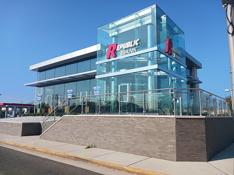 Featuring a glassy facade, the Republic Bank building dominates the corner of Ninth Street and West Avenue.