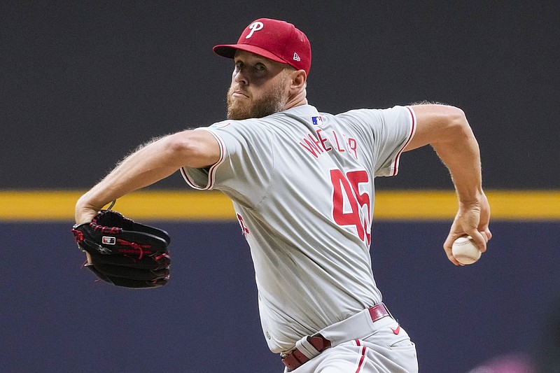 Sep 17, 2024; Milwaukee, Wisconsin, USA;  Philadelphia Phillies pitcher Zack Wheeler (45) throws a pitch during the first inning against the Milwaukee Brewers at American Family Field. Mandatory Credit: Jeff Hanisch-Imagn Images