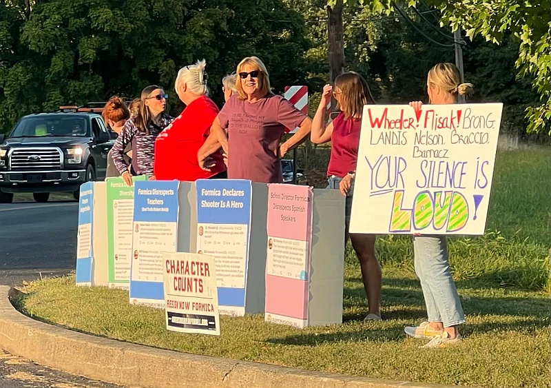 Souderton Area School District residents hold a roadside protest against director Bill Formica ahead of the September 11 committee meetings. (Courtesy of Richard Detweiler)