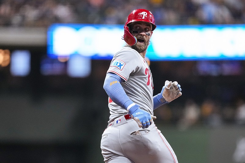 Sep 17, 2024; Milwaukee, Wisconsin, USA;  Philadelphia Phillies first baseman Bryce Harper (3) celebrates after hitting a home run during the sixth inning against the Milwaukee Brewers at American Family Field. Mandatory Credit: Jeff Hanisch-Imagn Images