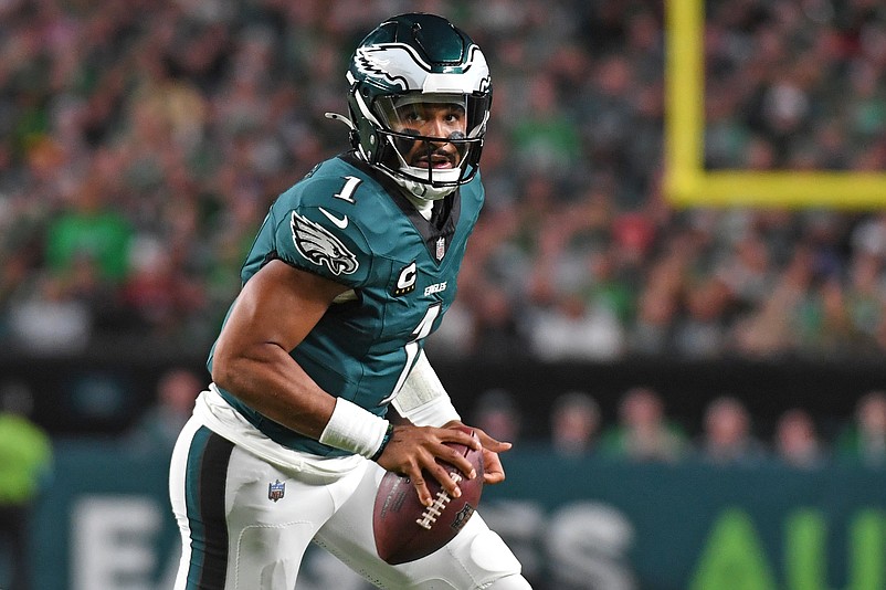 Sep 16, 2024; Philadelphia, Pennsylvania, USA; Philadelphia Eagles quarterback Jalen Hurts (1) runs with the football against the Atlanta Falcons at Lincoln Financial Field. Mandatory Credit: Eric Hartline-Imagn Images