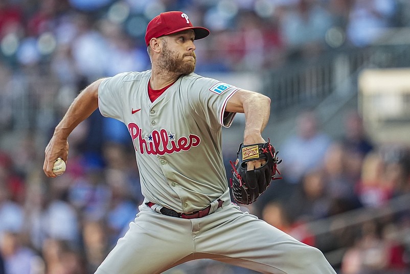 Aug 20, 2024; Cumberland, Georgia, USA; Philadelphia Phillies starting pitcher Zack Wheeler (45) pitches against the Atlanta Braves during the first inning at Truist Park. Mandatory Credit: Dale Zanine-USA TODAY Sports