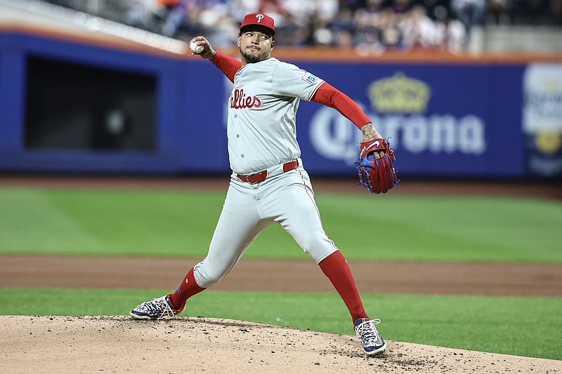 Sep 19, 2024; New York City, New York, USA;  Philadelphia Phillies starting pitcher Taijuan Walker (99) pitches in the first inning against the New York Mets at Citi Field. Mandatory Credit: Wendell Cruz-Imagn Images