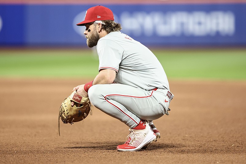 Sep 19, 2024; New York City, New York, USA;  Philadelphia Phillies first baseman Bryce Harper (3) watches during a piching change in the fourth inning against the New York Mets at Citi Field. Mandatory Credit: Wendell Cruz-Imagn Images