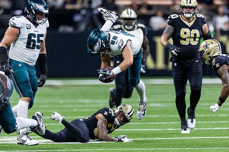 Sep 22, 2024; New Orleans, Louisiana, USA; New Orleans Saints safety Tyrann Mathieu (32) tackles Philadelphia Eagles tight end Dallas Goedert (88) during the first half at Caesars Superdome. Mandatory Credit: Stephen Lew-Imagn Images