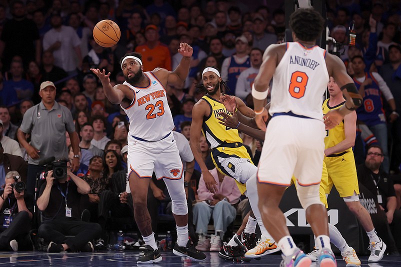 May 6, 2024; New York, New York, USA; New York Knicks center Mitchell Robinson (23) grabs a rebound against Indiana Pacers forward Isaiah Jackson (22) during the fourth quarter of game one of the second round of the 2024 NBA playoffs at Madison Square Garden. Mandatory Credit: Brad Penner-USA TODAY Sports