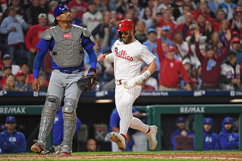 Sep 23, 2024; Philadelphia, Pennsylvania, USA; Philadelphia Phillies first base Bryce Harper (3) scores a run during the fifth inning against the Chicago Cubs at Citizens Bank Park. Mandatory Credit: Eric Hartline-Imagn Images