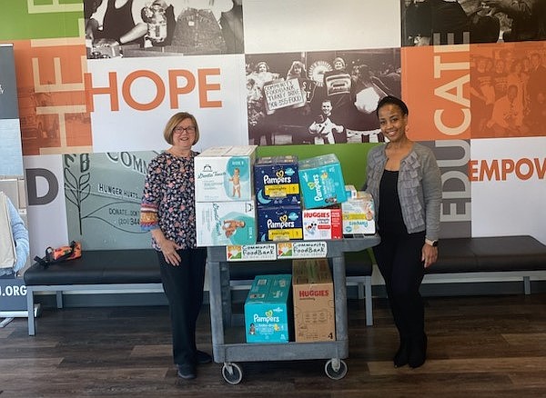 Provided/From left, South Jersey Women Fighting Hunger Chairwoman Kathy Corbalis and Community FoodBank of NJ Director of External Affairs Torrina Bennett-Michael with donations from last year’s #GreatBigDiaperDrive.