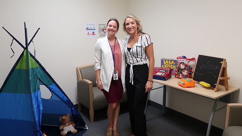 JFS/JFS staff members Lianna Shaw and Lily Elsohn Whitcraft showcase a children’s counseling room at the agency’s new office in Cape May Court House.