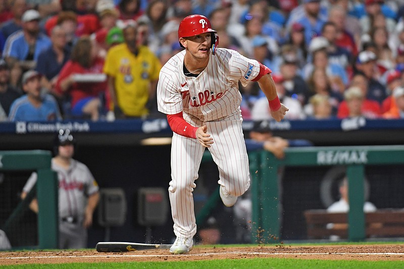 Aug 31, 2024; Philadelphia, Pennsylvania, USA; Philadelphia Phillies outfielder Austin Hays (9) hits a double during the second inning against the Atlanta Braves at Citizens Bank Park. Mandatory Credit: Eric Hartline-USA TODAY Sports