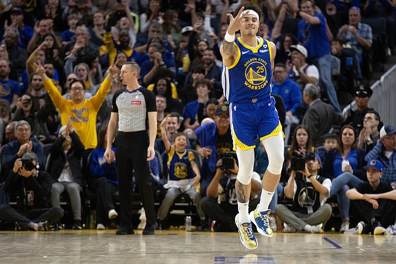 Feb 25, 2024; San Francisco, California, USA; Golden State Warriors guard Lester Quinones (25) celebrates his 3-point basket against the Denver Nuggets during the third quarter at Chase Center. Mandatory Credit: D. Ross Cameron-USA TODAY Sports