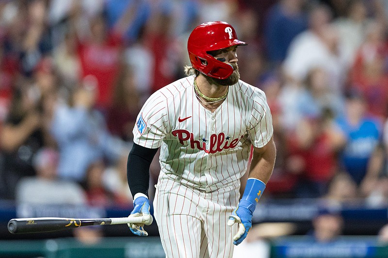 Sep 9, 2024; Philadelphia, Pennsylvania, USA; Philadelphia Phillies first base Bryce Harper (3) hits a single during the ninth inning against the Tampa Bay Rays at Citizens Bank Park. Mandatory Credit: Bill Streicher-Imagn Images