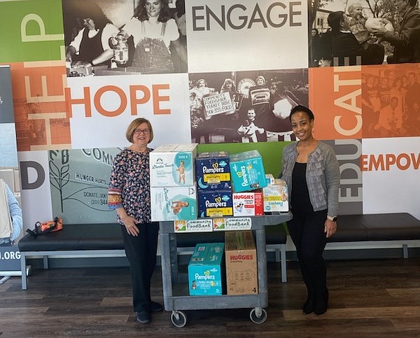 Women Fighting Hunger South Jersey Chair Kathy Corbalis, left, and Torrina Bennett-Michael, director of external affairs for the Community FoodBank of New Jersey.