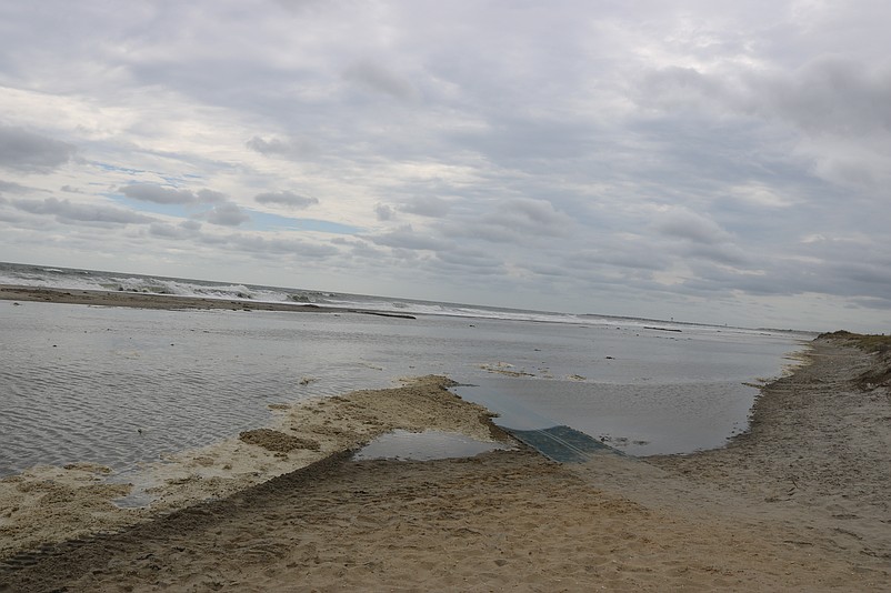 The Sea Isle City beach is swamped by the ocean during the extremely high tides.