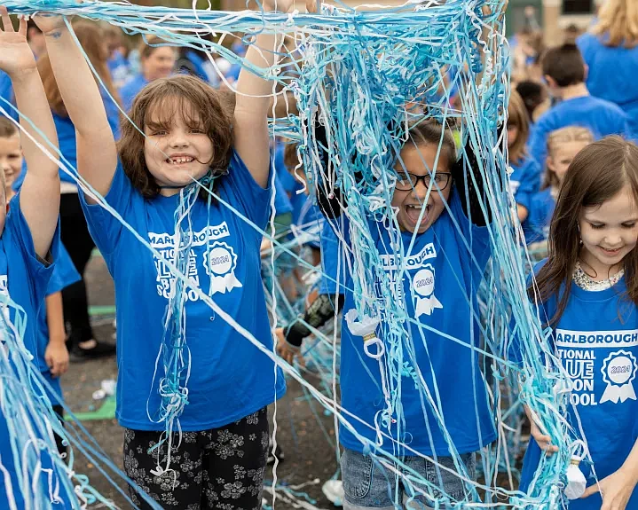 From left, Marlborough Elementary School students Brynn Tornetta and Natalie Marcelline help celebrate the school being named a Blue Ribbon School by the U.S. Dept. of Education. (Submitted Photo)