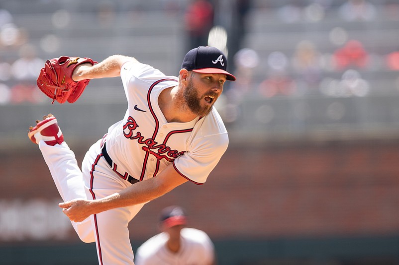 Sep 8, 2024; Cumberland, Georgia, USA; Atlanta Braves pitcher Chris Sale (51) pitches the ball against Toronto Blue Jays during first inning at Truist Park. Mandatory Credit: Jordan Godfree-Imagn Images