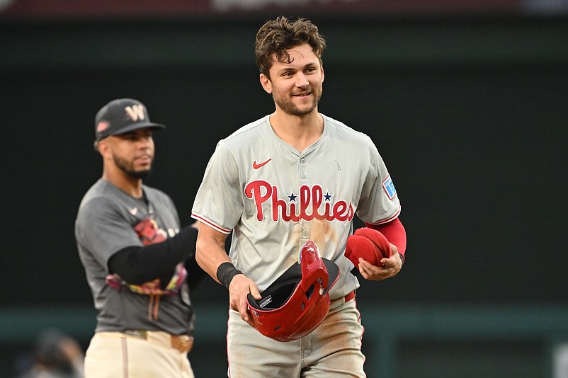 Sep 29, 2024; Washington, District of Columbia, USA; Philadelphia Phillies shortstop Trea Turner (7) reacts after video replay confirmed he was tagged out at second base during a stolen base attempt by Washington Nationals second baseman Luis Garcia Jr. (2) during the seventh inning at Nationals Park. Mandatory Credit: Rafael Suanes-Imagn Images