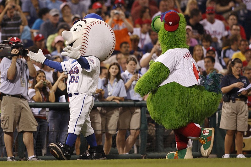 Aug 27, 2007; Philadelphia, PA, USA; New York Mets mascot, Mr. Met and the Philadelphia Phillies mascot, the Phillie Phanatic on the field between innings promoting the Mascot Hall of Fame at Citizens Bank Park in Philadelphia, PA. The Phillies defeated the Mets 9-2. Mandatory Credit: Howard Smith-USA TODAY Sports Copyright © 2007 Howard Smith