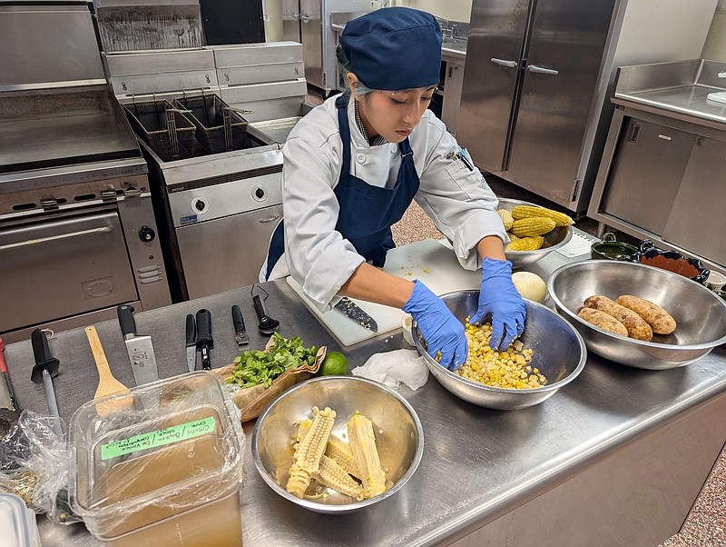 Academy of Culinary Arts student Citlally Cruz prepares her ingredients at the beginning of the competition.