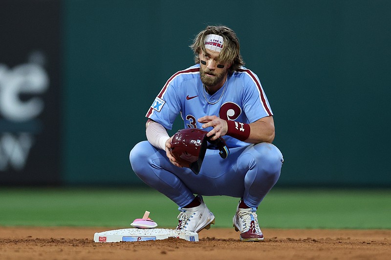 Aug 15, 2024; Philadelphia, Pennsylvania, USA; Philadelphia Phillies first base Bryce Harper (3) crouches on second base after his RBI single during the fourth inning against the Washington Nationals at Citizens Bank Park. Mandatory Credit: Bill Streicher-USA TODAY Sports