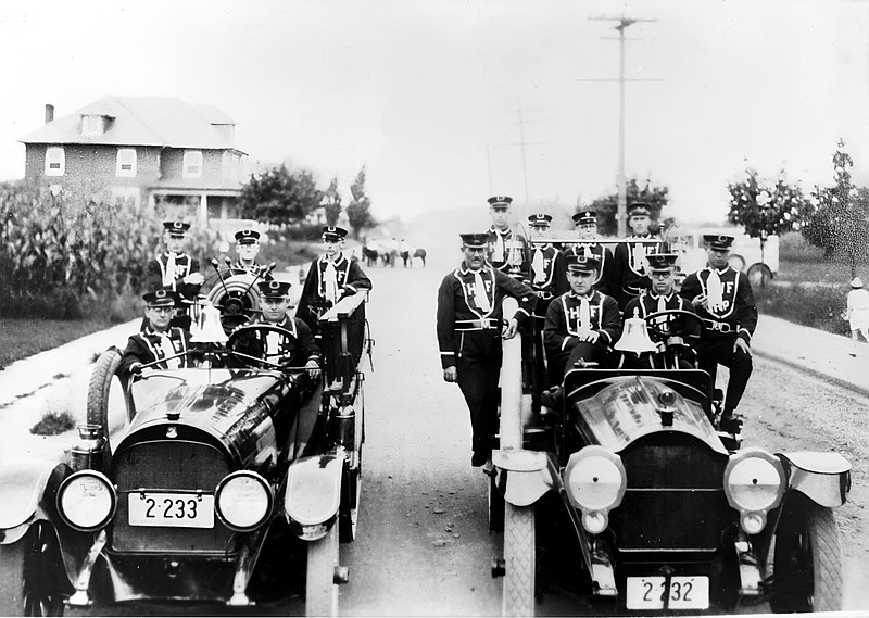 On board the Cole chemical engine on the left are: John Godshall in the driver’s seat with Chief Elmer Zepp sitting next to him; standing behind are (l to r) Lincoln Benner, Walter Kriebel, and J. Lloyd Wagner. Driving the Packard pumper on the right is Frank Slotter, with Asst. Chief Horace Davis; the others on the Packard are (l to r) Isaac Rosenberger, Frank Price, Roland Smith, George Stoneback, and Archie Smith. (Credit: Hatfield Museum & History Society.)