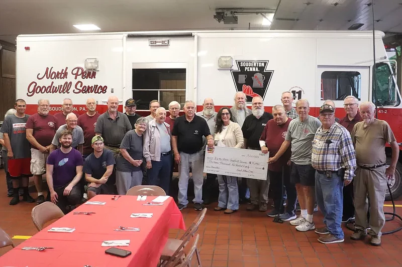 East Allen EMS past president Michele Morrow presents a check of $13,480 to North Penn Goodwill Service, Inc. in Souderton.