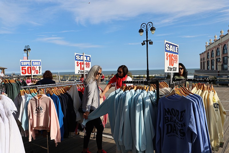 Shirt Shack's clearance racks draw shoppers on the Boardwalk.
