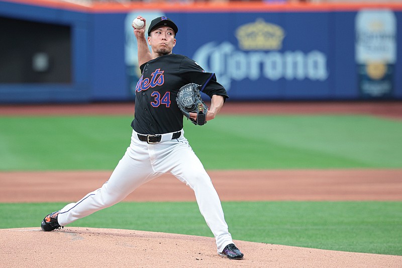 Jul 26, 2024; New York City, New York, USA; New York Mets starting pitcher Kodai Senga (34) delivers a pitch during the first inning against the Atlanta Braves at Citi Field. Mandatory Credit: Vincent Carchietta-USA TODAY Sports