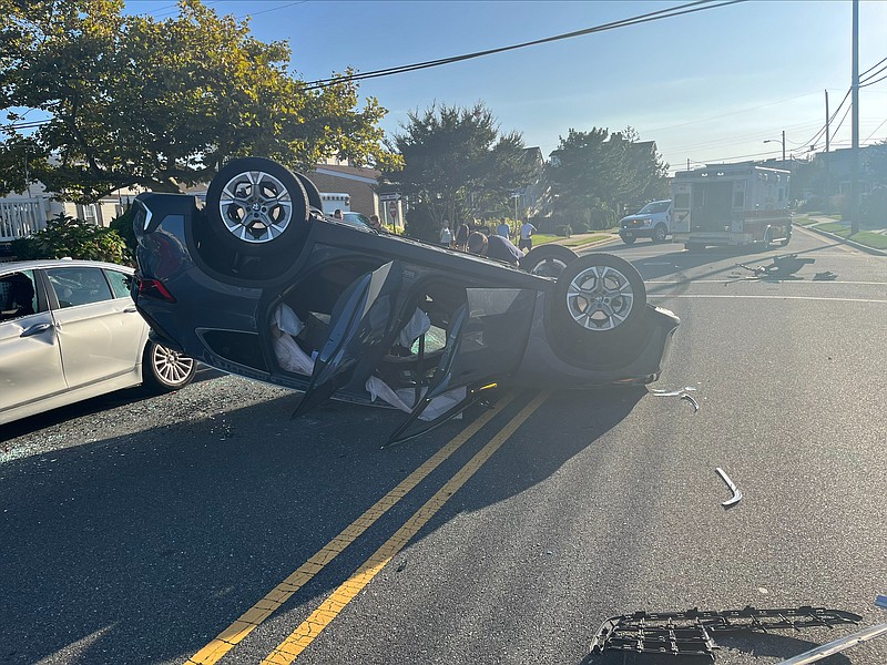 A vehicle overturned on Winchester Avenue in Longport, injuring the driver and her passenger.