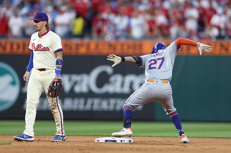 Oct 5, 2024; Philadelphia, PA, USA; New York Mets third baseman Mark Vientos (27) reacts after driving in the tying run against the Philadelphia Phillies in the eighth inning in game one of the NLDS for the 2024 MLB Playoffs at Citizens Bank Park. Mandatory Credit: Bill Streicher-Imagn Images