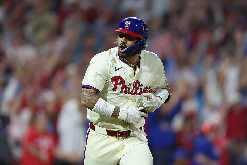 Oct 6, 2024; Philadelphia, Pennsylvania, USA; Philadelphia Phillies outfielder Nick Castellanos (8) reacts after hitting a walk off game winning RBI single during the ninth inning against the New York Mets in game two of the NLDS for the 2024 MLB Playoffs at Citizens Bank Park. Mandatory Credit: Bill Streicher-Imagn Images