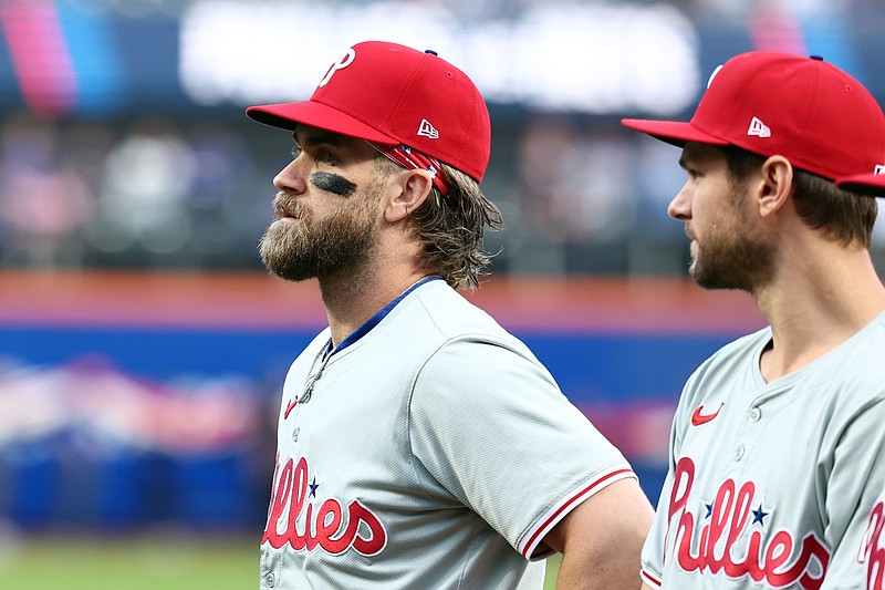 Oct 8, 2024; New York City, New York, USA; Philadelphia Phillies first baseman Bryce Harper (3) looks on before game three against the New York Mets in the NLDS for the 2024 MLB Playoffs at Citi Field. Mandatory Credit: Vincent Carchietta-Imagn Images