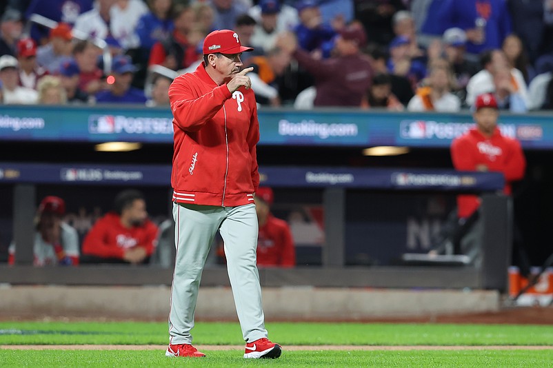 Oct 8, 2024; New York City, New York, USA; Philadelphia Phillies manager Rob Thomson (59) walks to the mound in the seventh inning against the New York Mets during game three of the NLDS for the 2024 MLB Playoffs at Citi Field. Mandatory Credit: Brad Penner-Imagn Images