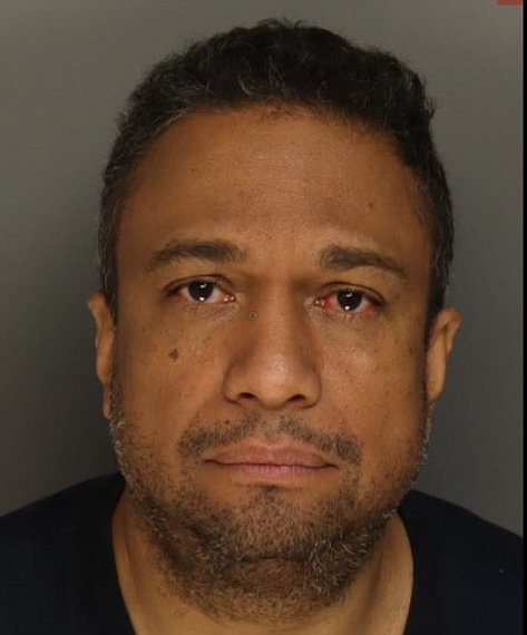 Aldenis Gonzalez-Caceres, 52, of Milford Township. (Credit: Bucks County District Attorney's Office)