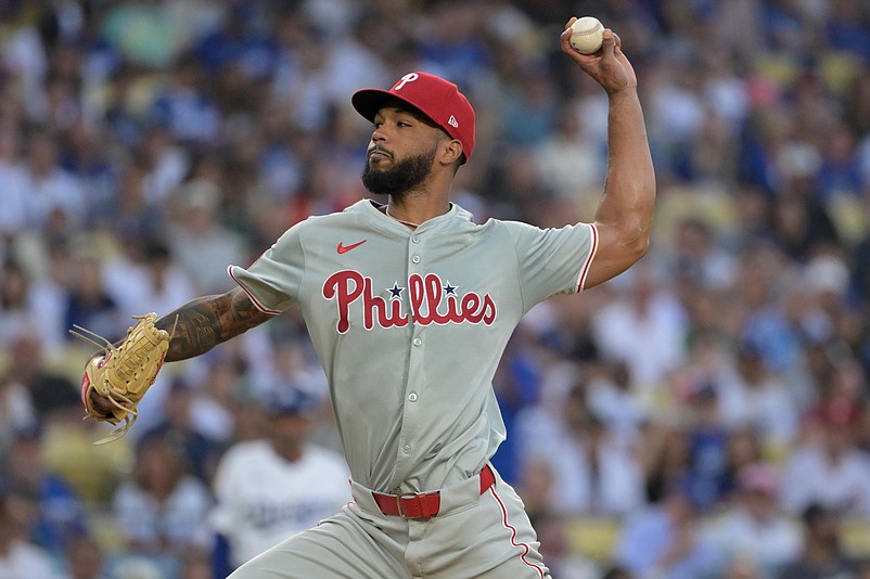 Aug 6, 2024; Los Angeles, California, USA;  Philadelphia Phillies starting pitcher Cristopher Sanchez (61) delivers to the plate in the first inning against the Los Angeles Dodgers at Dodger Stadium. Mandatory Credit: Jayne Kamin-Oncea-USA TODAY Sports