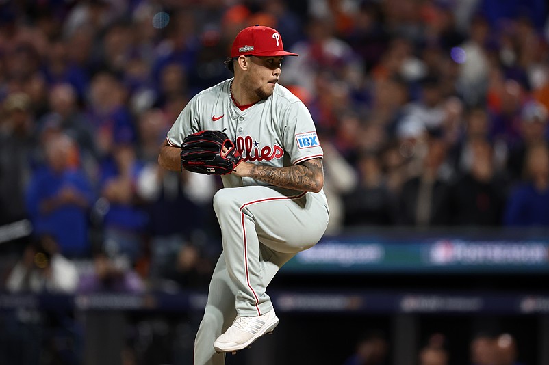 Oct 8, 2024; New York City, New York, USA; Philadelphia Phillies pitcher Orion Kerkering (50) pitches in the sixth inning against the New York Mets during game three of the NLDS for the 2024 MLB Playoffs at Citi Field. Mandatory Credit: Vincent Carchietta-Imagn Images