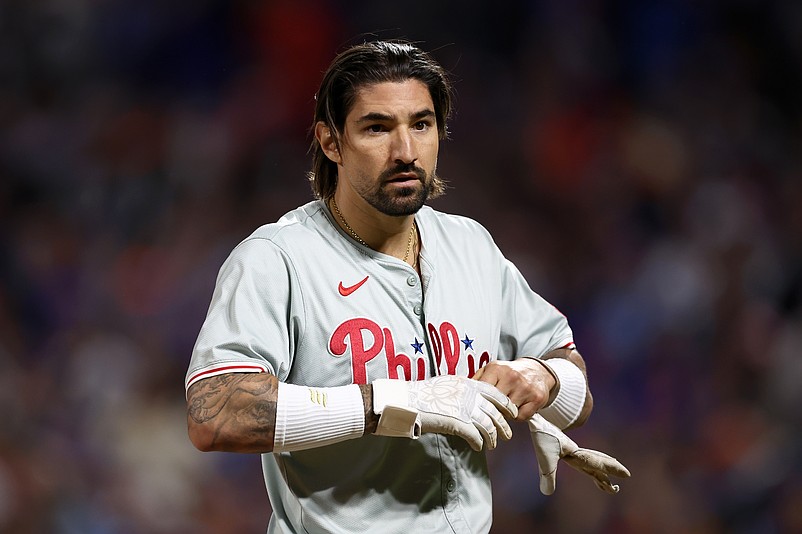 Oct 8, 2024; New York City, New York, USA; Philadelphia Phillies outfielder Nick Castellanos (8) reacts in the eighth inning against the New York Mets during game three of the NLDS for the 2024 MLB Playoffs at Citi Field. Mandatory Credit: Vincent Carchietta-Imagn Images