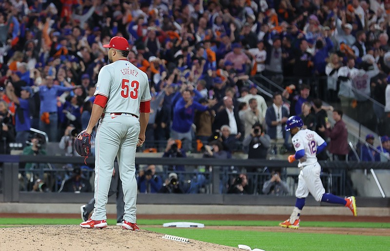 Oct 9, 2024; New York, New York, USA; Philadelphia Phillies pitcher Carlos Estevez (53) reacts after giving up a grand slam to New York Mets shortstop Francisco Lindor (12) in the sixth inning  in game four of the NLDS for the 2024 MLB Playoffs at Citi Field. Mandatory Credit: Brad Penner-Imagn Images