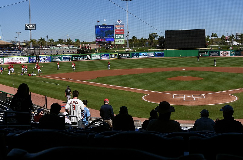 Mar 4, 2021; Clearwater, Florida, USA; Fans watch the New York Yankees and Philadelphia Phillies warm up before the start of their game during spring training at Spectrum Field. Mandatory Credit: Jonathan Dyer-USA TODAY Sports