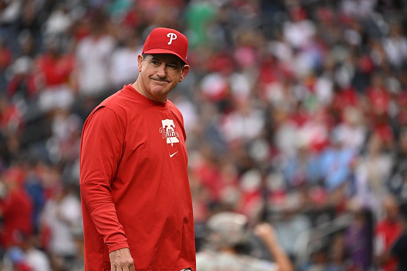 Sep 29, 2024; Washington, District of Columbia, USA; Philadelphia Phillies manager Rob Thomson (59) walks back to the dugout after a visit to the mound against the Washington Nationals during the sixth inning at Nationals Park. Mandatory Credit: Rafael Suanes-Imagn Images