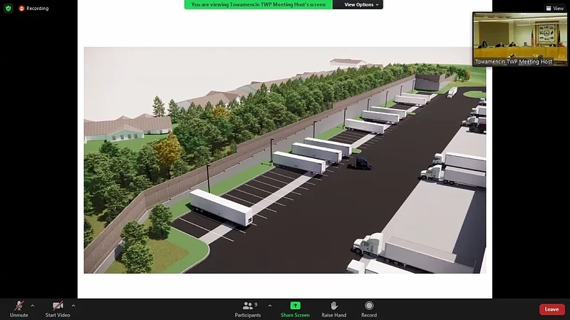 Towamencin’s board of supervisors, inset, see a rendering of a proposed warehouse on Delp Drive, at right, and the retaining wall and wooded area between it and houses of the Dock Woods community, at left, during their March 23 2022 meeting. (Screenshot of online meeting)