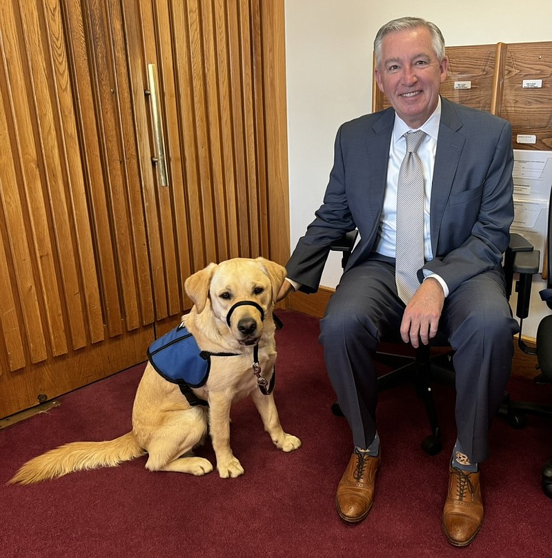 K-9 Barney and Montgomery County District Attorney Kevin Steele. (Credit: Montgomery County District Attorney's Office.)